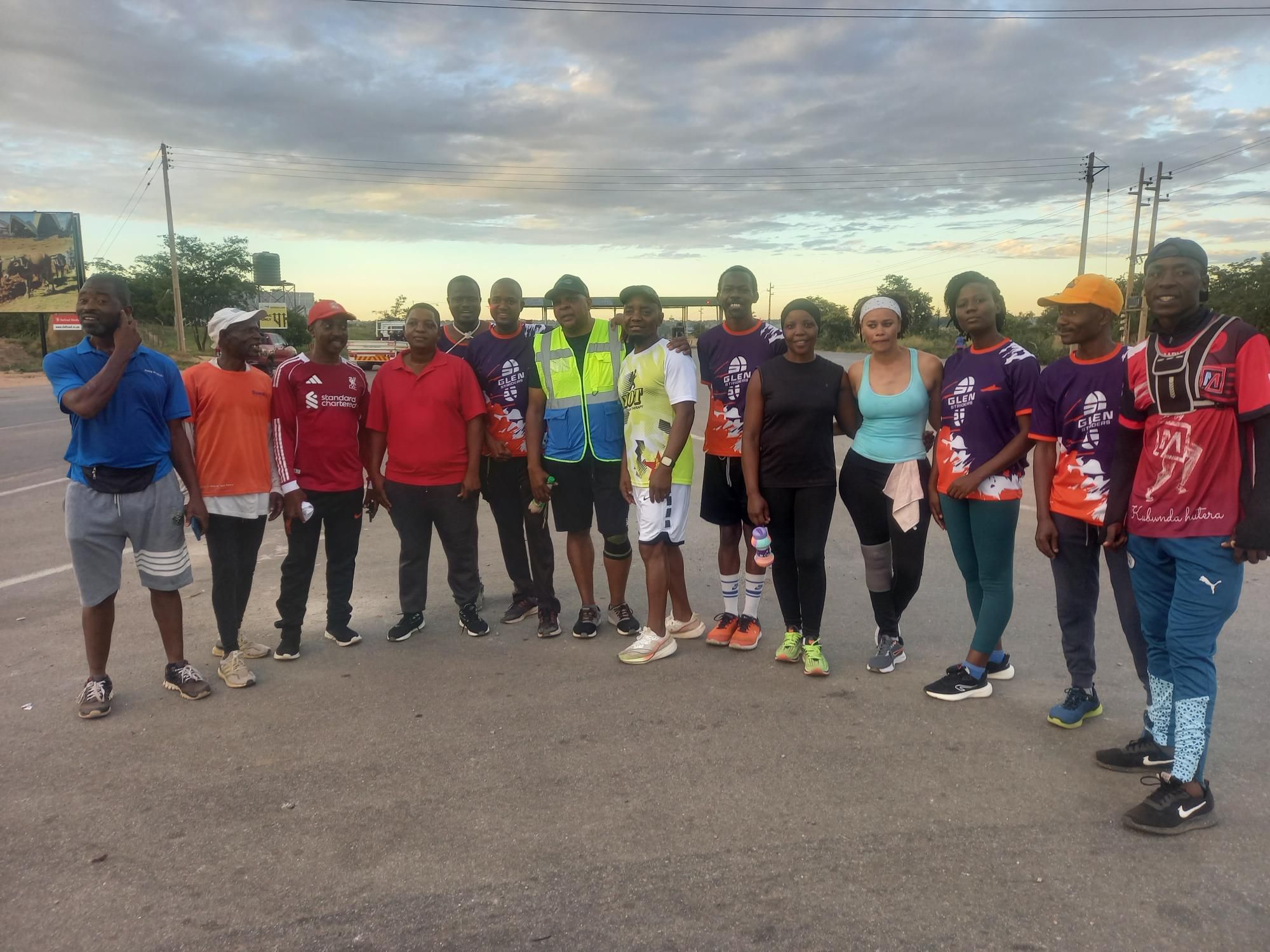On the road with fellow runners — Beatrice 30km sign
