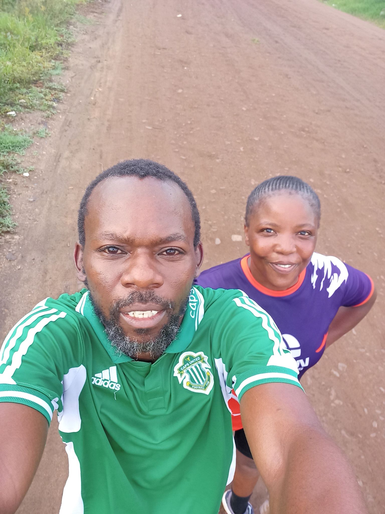Humphrey and Linda on the dirt road — early days