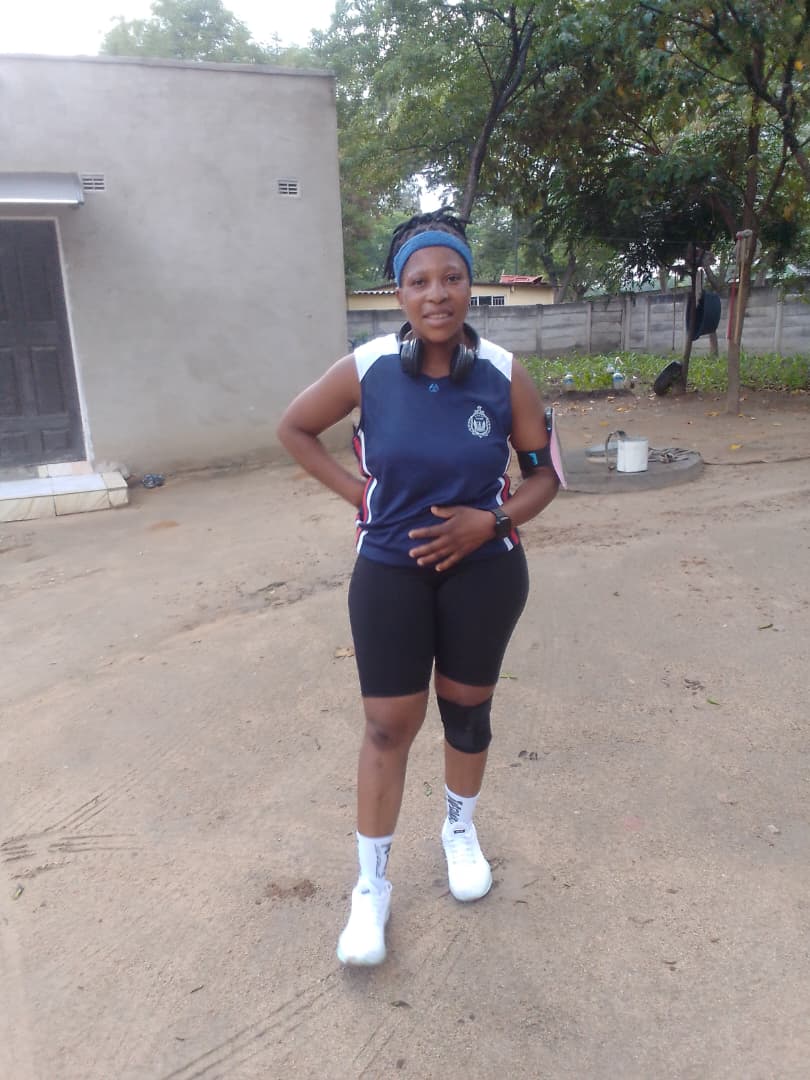 Tracey at the finish line, celebrating her achievement